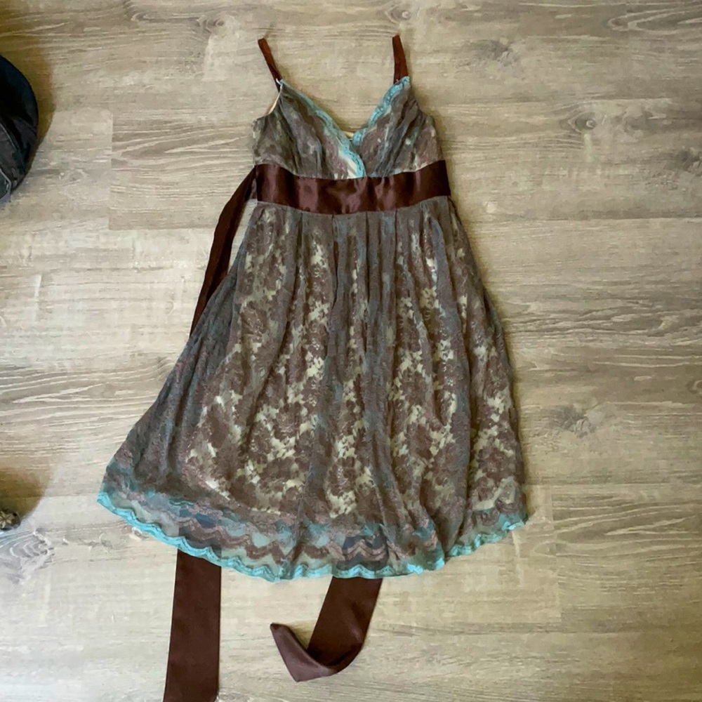 Green, turquoise, brown, and tan dress